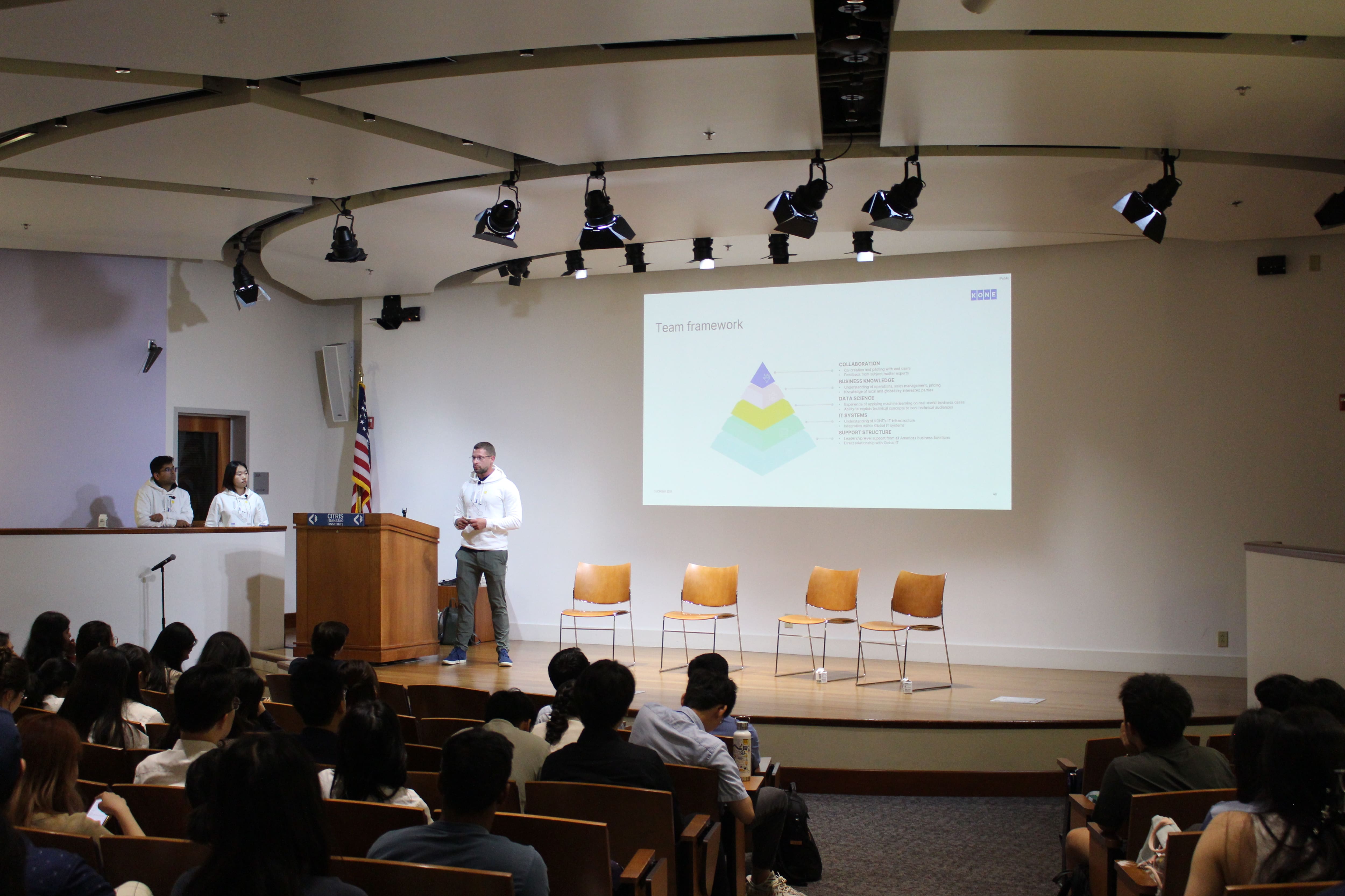 KONE colleagues speaking on campus as part of the KONE Fellowship for Future Analytics leaders