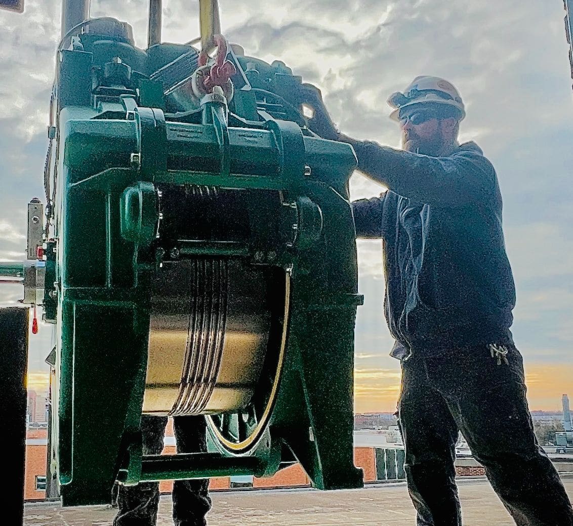 Eric Kline landing a KONE MX machine on the roof of St. Peter’s University Hospital during a recent crane day operation.