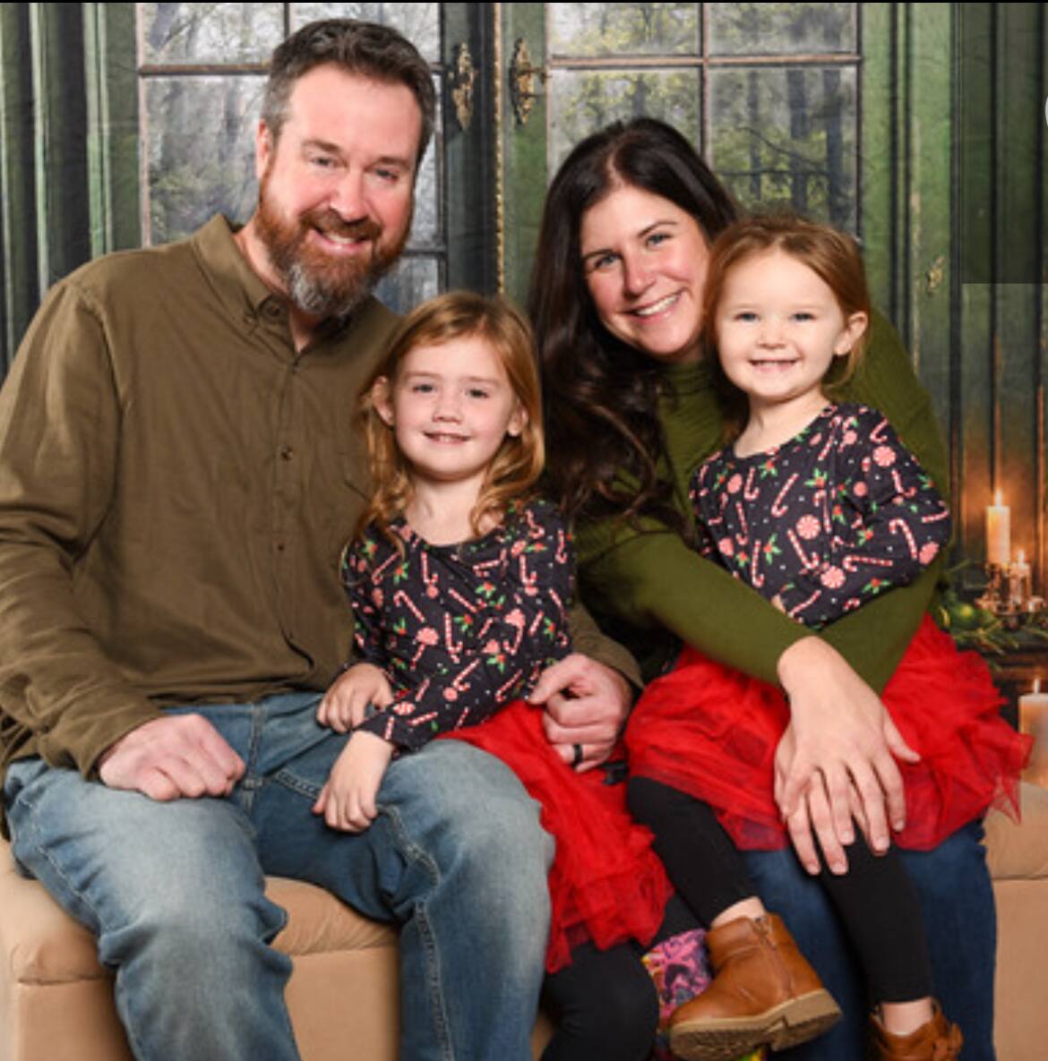 Eric and Vanessa Kline with daughters Charlotte (right) and Madison.